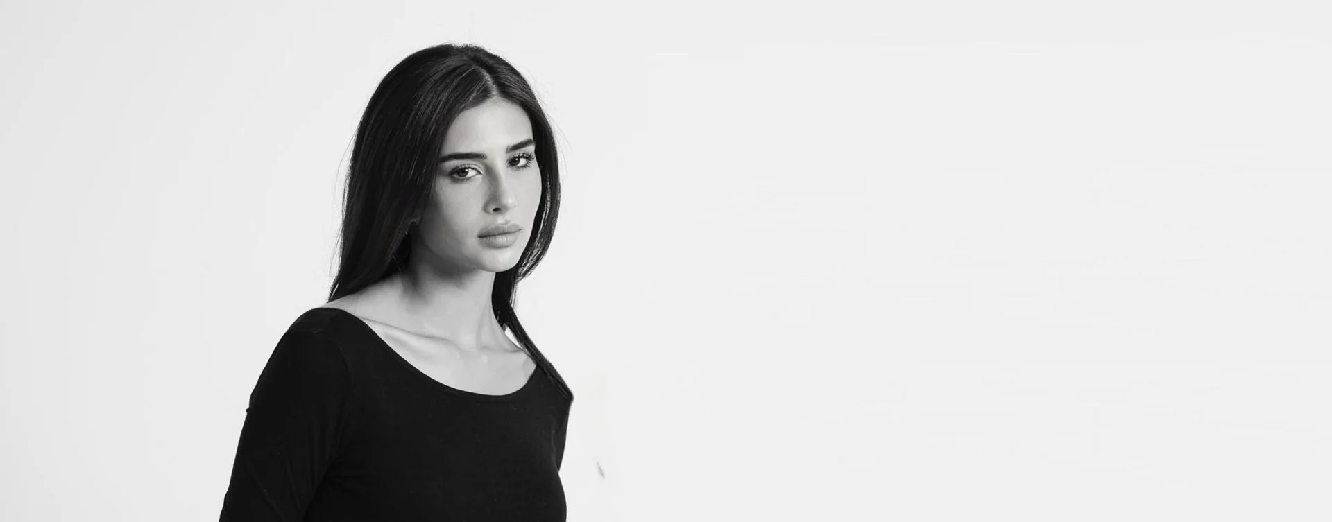 Rahaf Alharbi, black-and-white studio portrait
